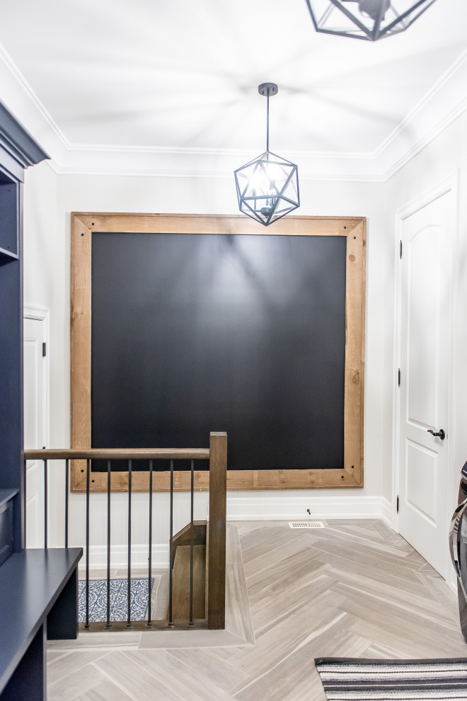 Example of a transitional home design design in Toronto