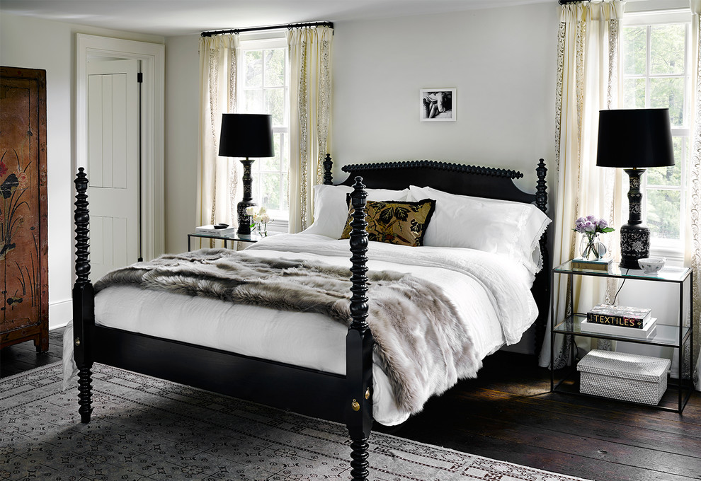 Design ideas for a traditional master bedroom in Chicago with grey walls and dark hardwood floors.