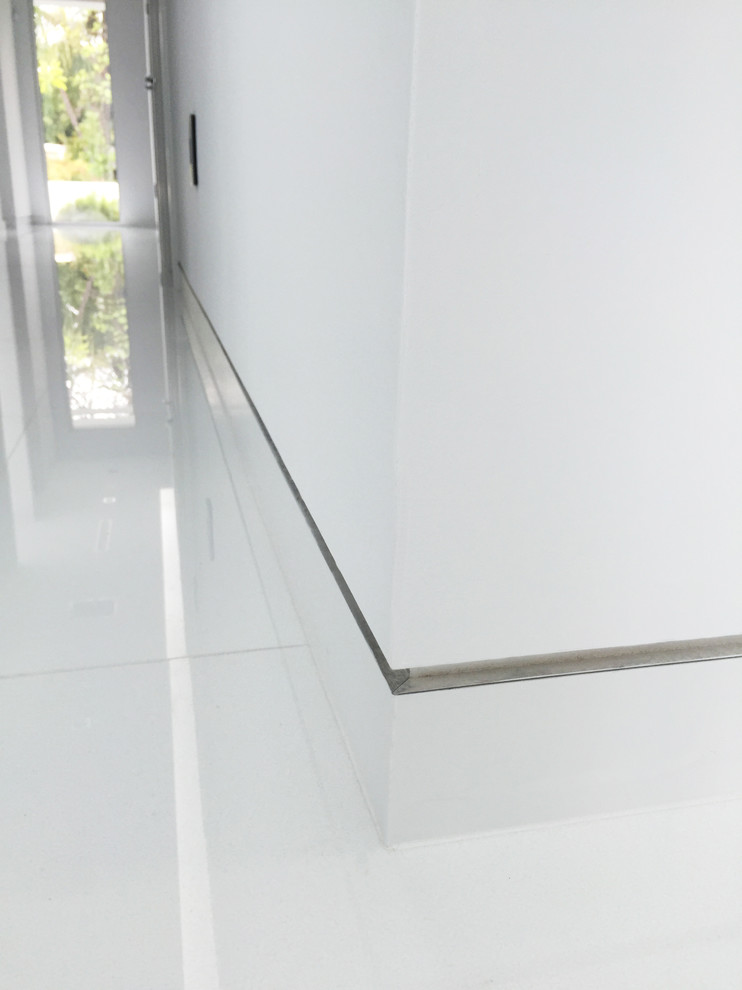 Recessed baseboard and metal profile