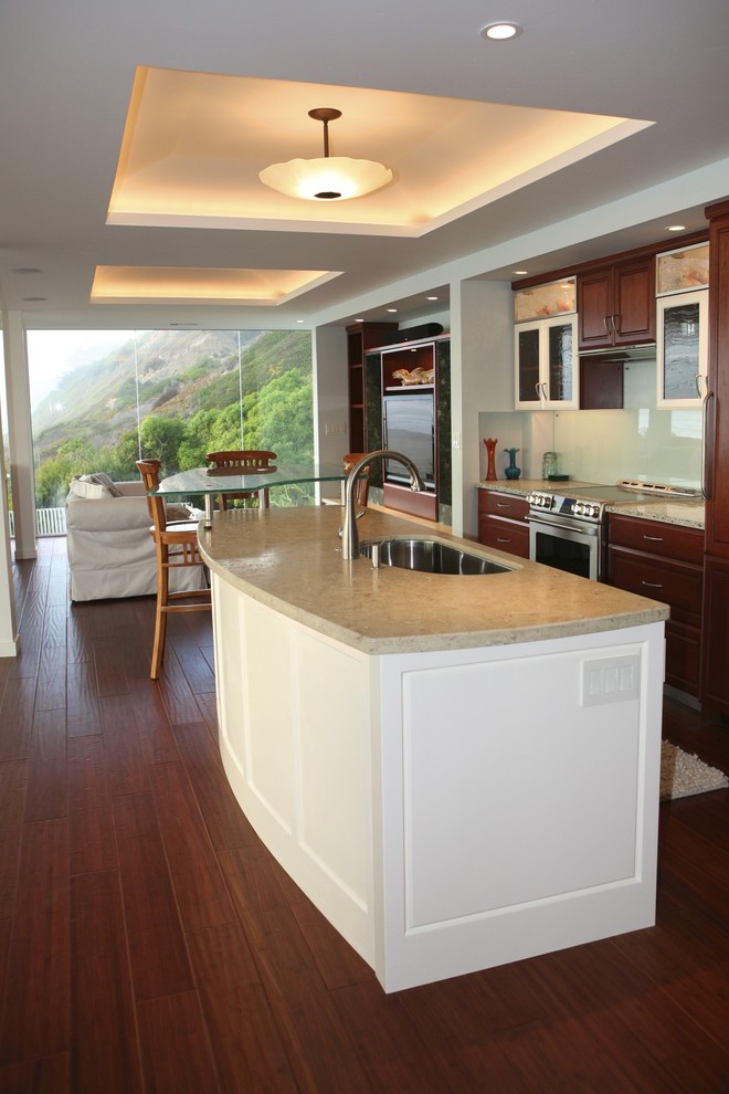 Curved Kitchen Island With Custom Lighted Tray Ceiling