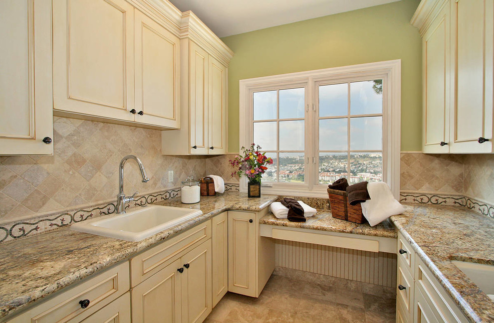 Photo of a traditional laundry room in San Diego.