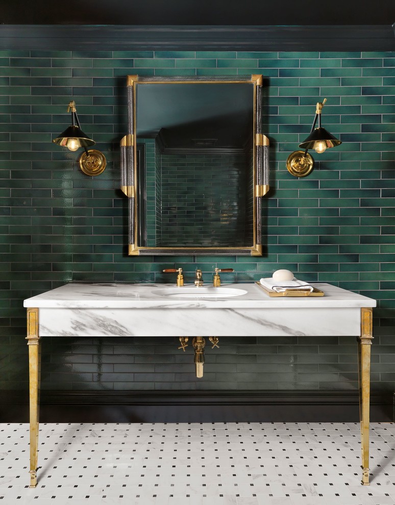 Photo of a traditional powder room in St Louis with green tile, subway tile, green walls, an undermount sink, marble benchtops, multi-coloured floor and white benchtops.