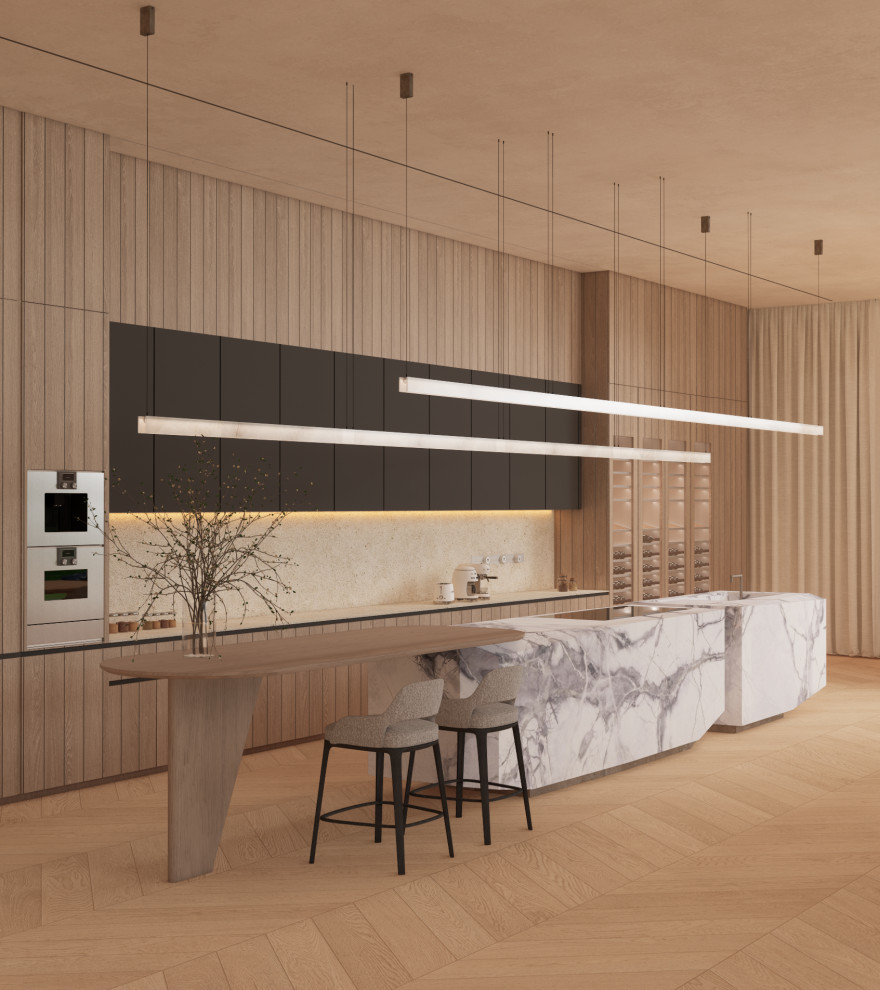 Large minimalist light wood floor, brown floor and tray ceiling eat-in kitchen photo with a single-bowl sink, flat-panel cabinets, light wood cabinets, marble countertops, white backsplash, stone slab backsplash, stainless steel appliances, an island and white countertops