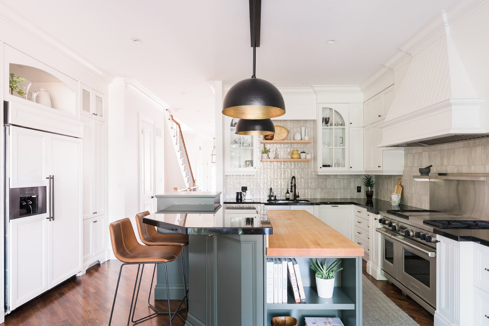 Example of a transitional kitchen design in Toronto