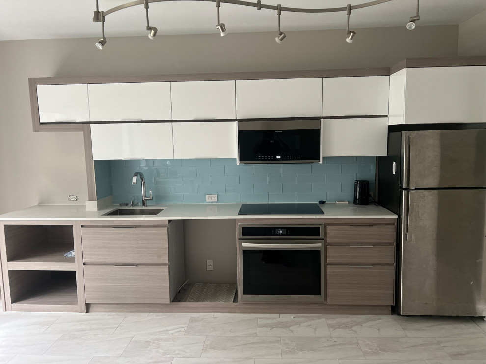 Design ideas for a small modern single-wall eat-in kitchen in Miami with quartz benchtops.