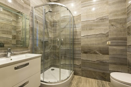 Transform Your Bathroom into a Serene Oasis with A & E Construction Design Build