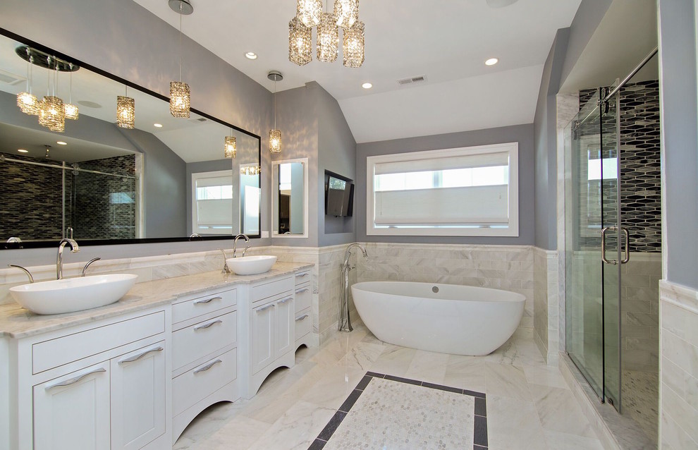 Transitional bathroom in Chicago with shaker cabinets, white cabinets, a freestanding tub, an alcove shower, purple walls, a vessel sink and a sliding shower screen.