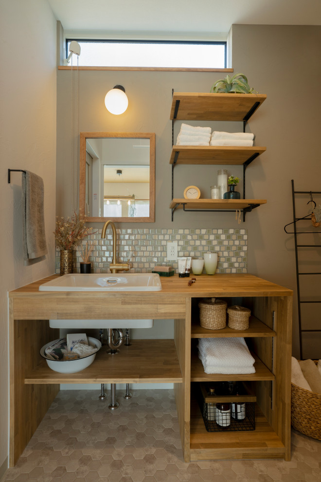 Design ideas for a scandi cloakroom in Other with brown cabinets, grey tiles, brown worktops and a built in vanity unit.