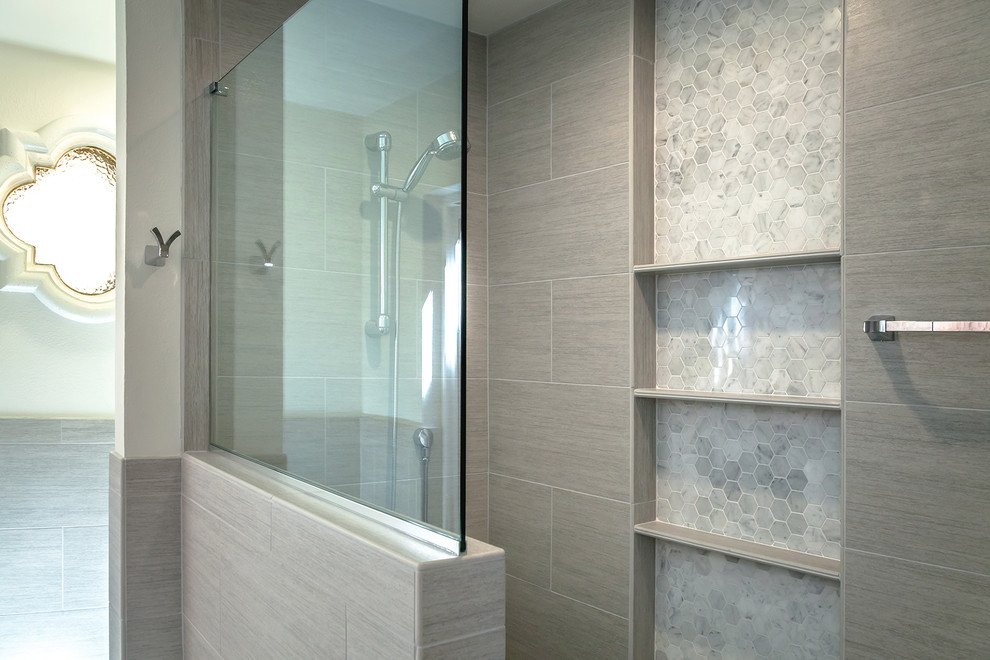 Inspiration for a mid-sized transitional master bathroom in Phoenix with flat-panel cabinets, brown cabinets, a curbless shower, a one-piece toilet, gray tile, porcelain tile, beige walls, porcelain floors, an undermount sink, engineered quartz benchtops, grey floor and an open shower.