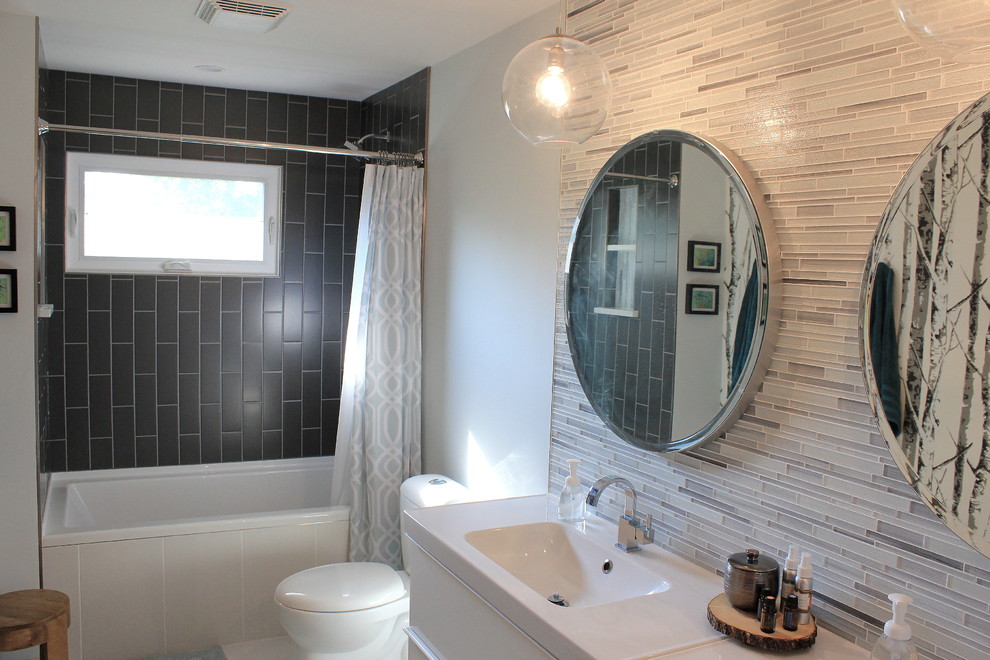 Design ideas for a mid-sized contemporary master bathroom in Other with flat-panel cabinets, white cabinets, a corner tub, a shower/bathtub combo, a one-piece toilet, white walls, an integrated sink, beige tile, matchstick tile, quartzite benchtops and a shower curtain.