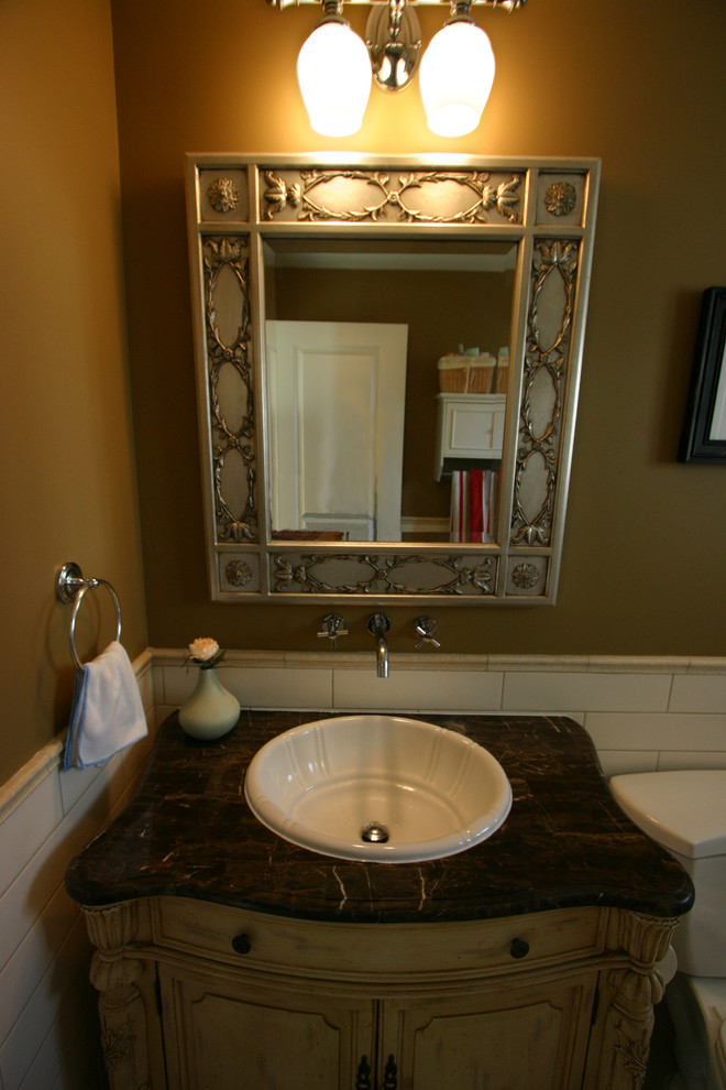 Photo of a transitional powder room in Vancouver.