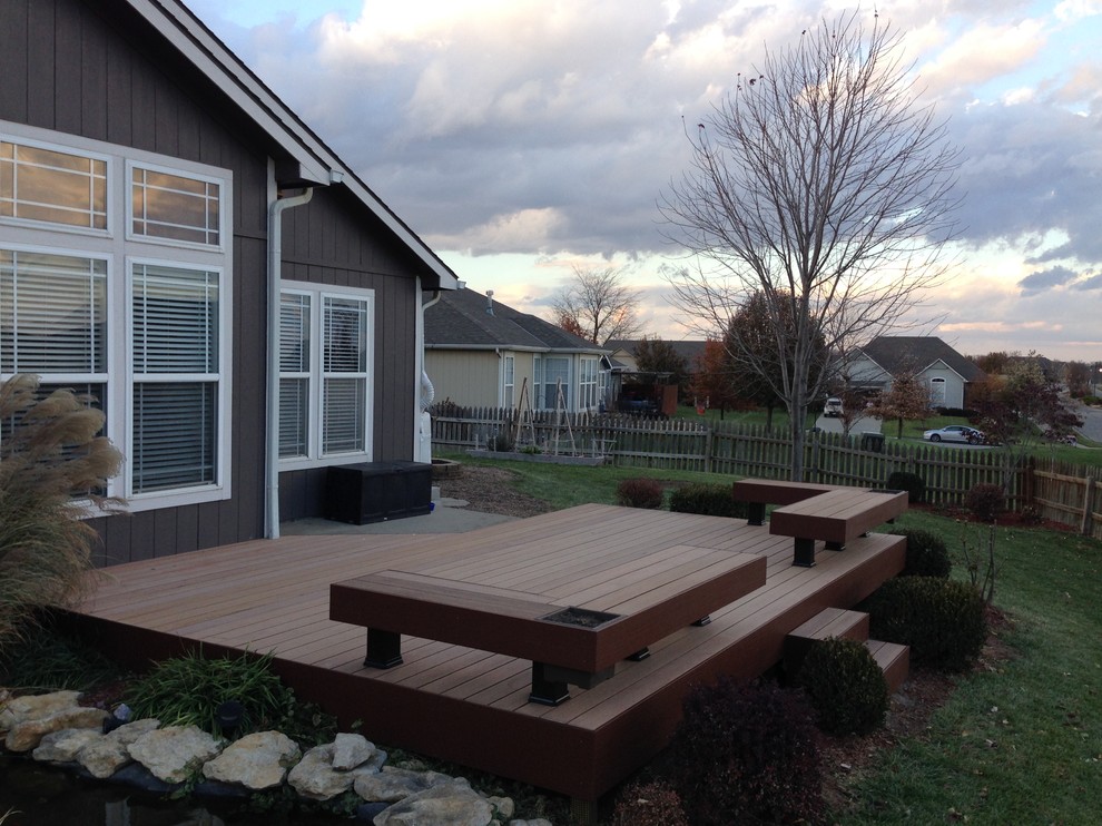 Deck - mid-sized backyard deck idea in Kansas City with no cover