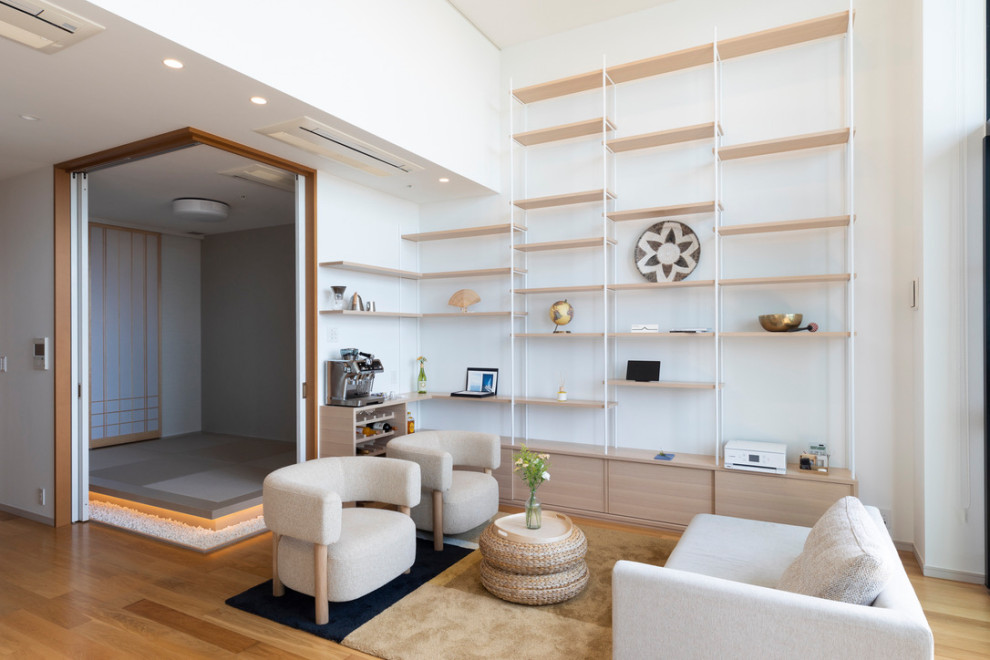 This is an example of a large scandinavian living room in Tokyo with white walls, tatami flooring, no tv, beige floors, a wallpapered ceiling and wallpapered walls.