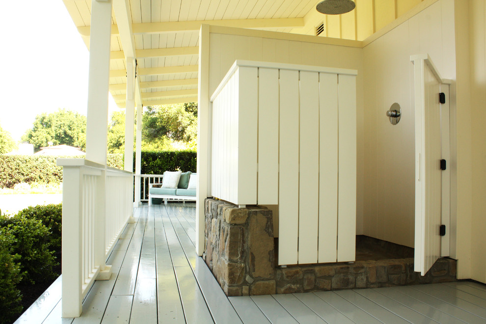 Inspiration for a country patio in Santa Barbara with decking, a roof extension and an outdoor shower.