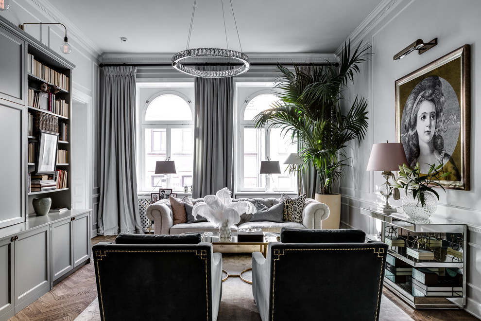 Mid-sized traditional formal enclosed living room in Stockholm with grey walls, dark hardwood floors and no tv.