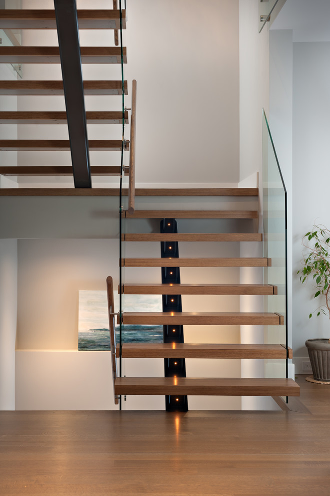 Design ideas for a transitional staircase in Vancouver.