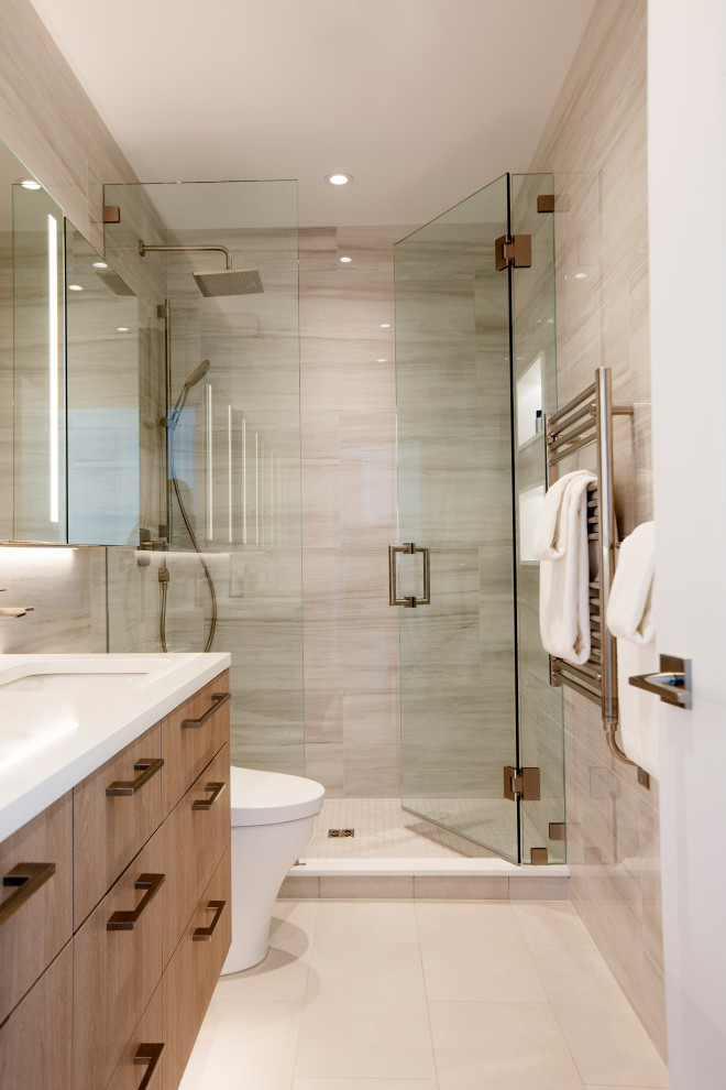 Photo of a mid-sized contemporary bathroom in Vancouver with stone tile, white benchtops and a single vanity.