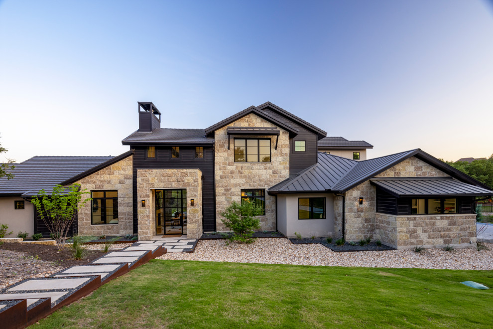 Inspiration for a transitional exterior home remodel in Austin