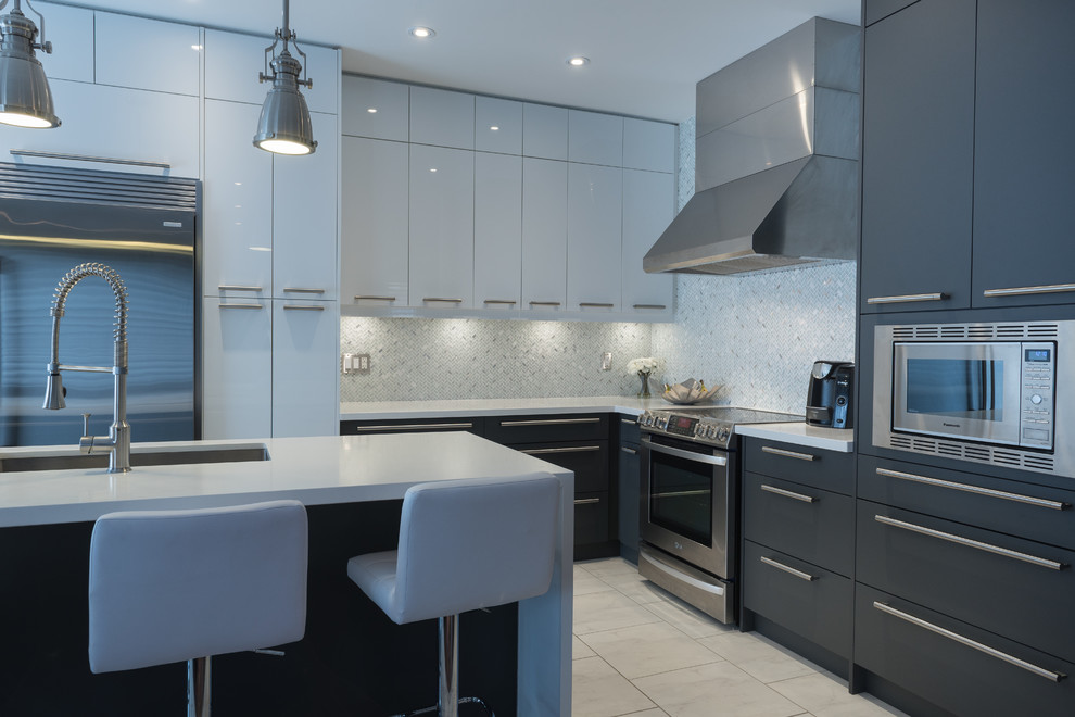 Mid-sized modern l-shaped open plan kitchen in Other with an undermount sink, glass-front cabinets, white cabinets, quartz benchtops, grey splashback, marble splashback, stainless steel appliances, porcelain floors, with island, multi-coloured floor and white benchtop.