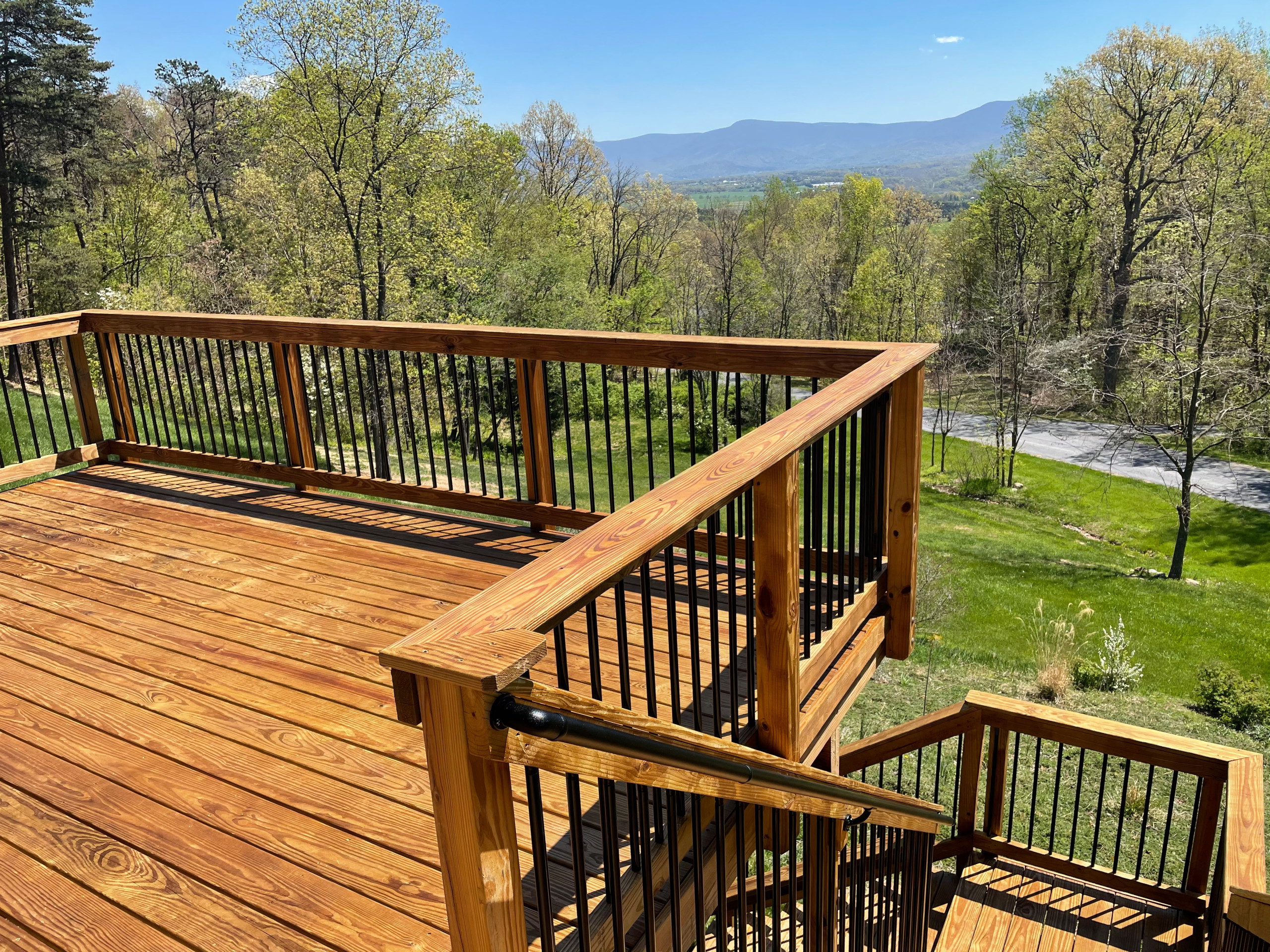 Deck stain and gutters power wash