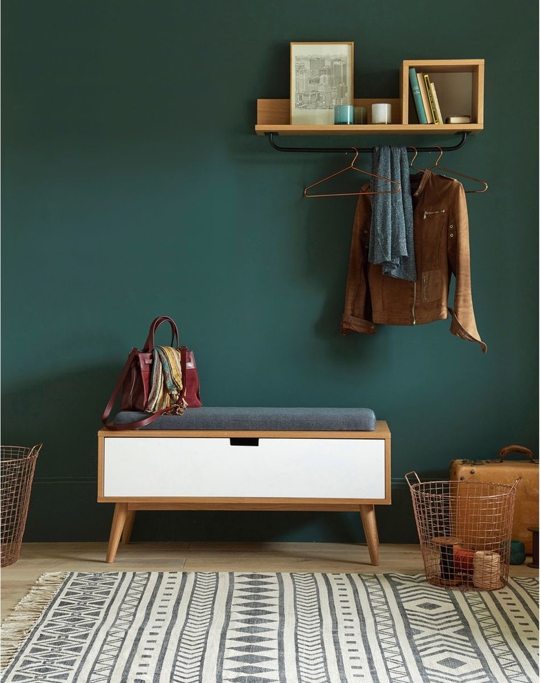 Design ideas for a midcentury mudroom in Lille with green walls and light hardwood floors.