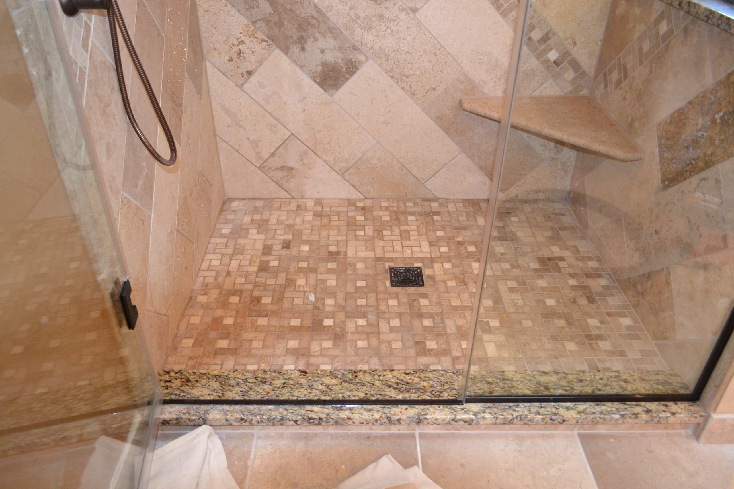 Travertine Shower with glass enclosure