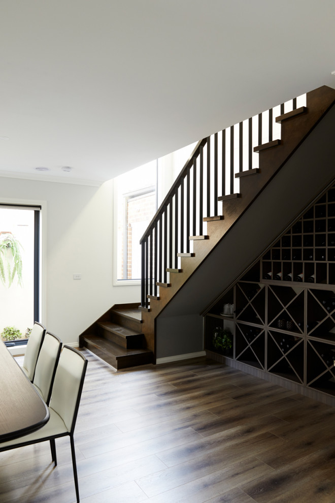 Medium sized contemporary wood l-shaped wood railing staircase in Melbourne with wood risers.
