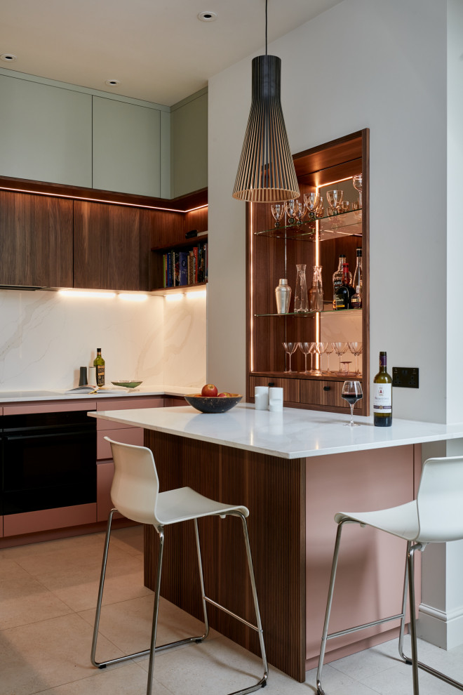 Inspiration for a small contemporary l-shaped home bar in London with an integrated sink, louvered cabinets, red cabinets, quartzite benchtops, beige splashback, engineered quartz splashback, ceramic floors, brown floor and beige benchtop.
