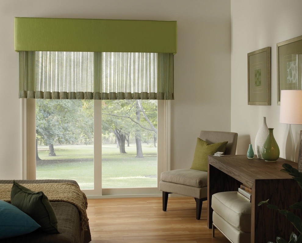 Bedroom - transitional light wood floor bedroom idea with white walls