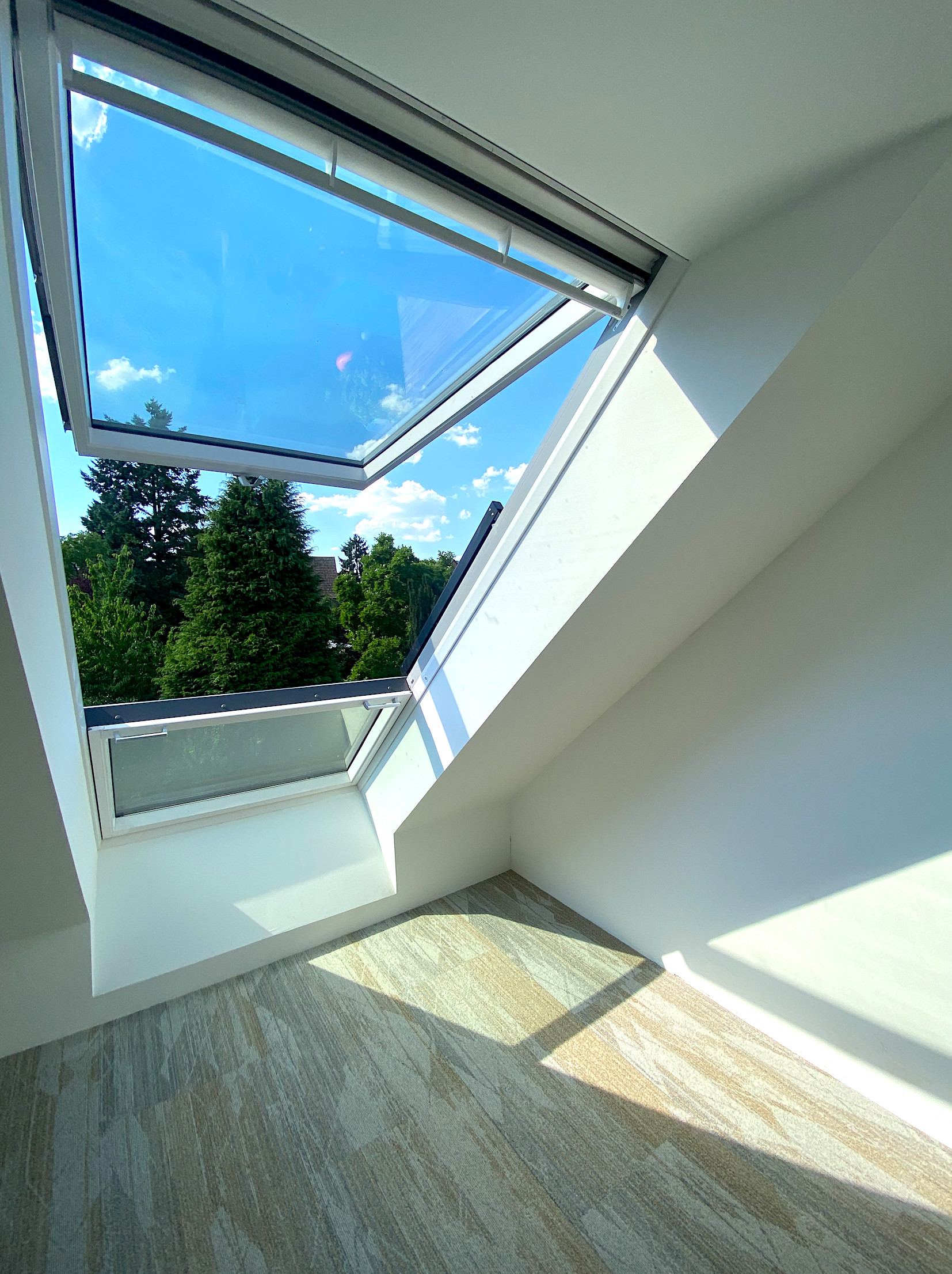 Dachumbau mit Wendeltreppe