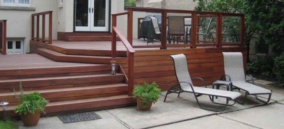 Mid-sized transitional backyard deck photo in Seattle with no cover