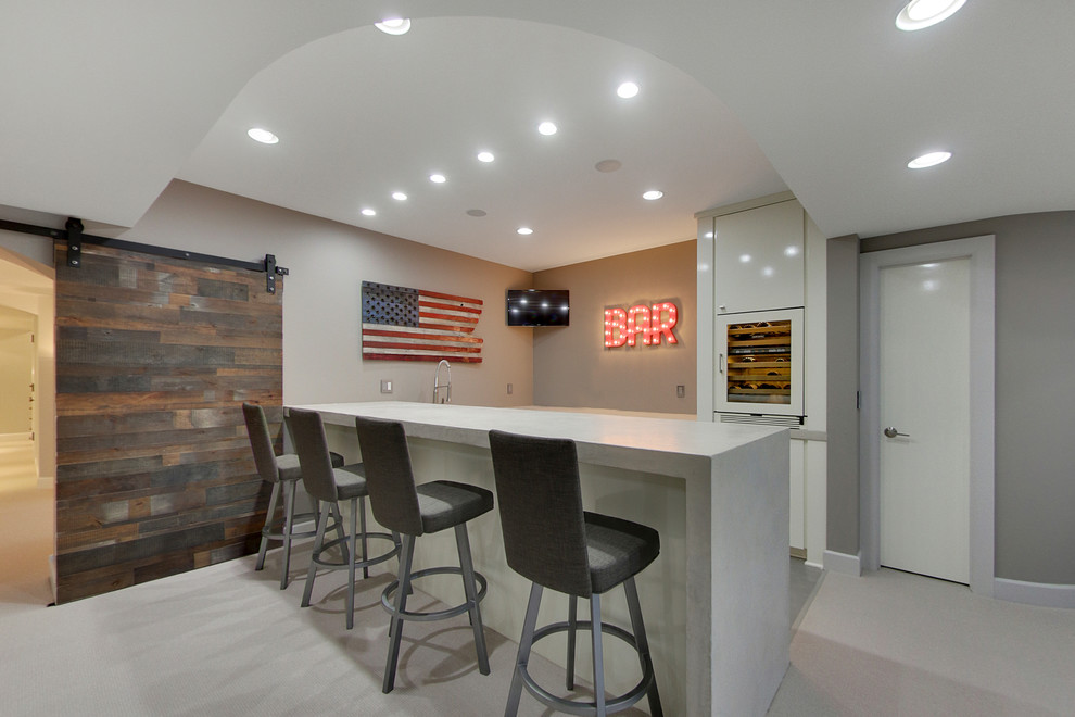 Inspiration for a mid-sized contemporary fully buried basement in Minneapolis with grey walls, carpet, no fireplace and a home bar.