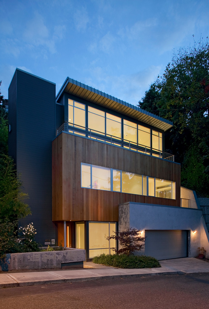 Contemporary exterior in Portland with wood siding.