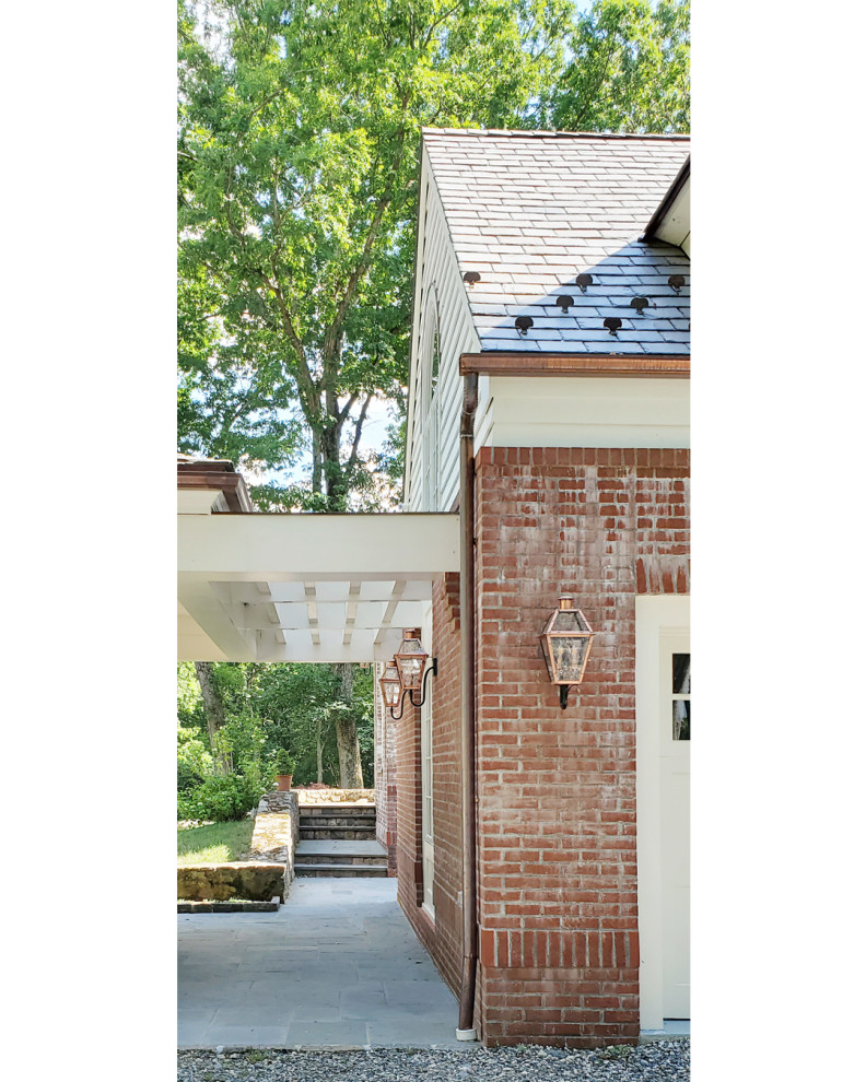 Example of a mid-sized classic attached one-car carport design in New York