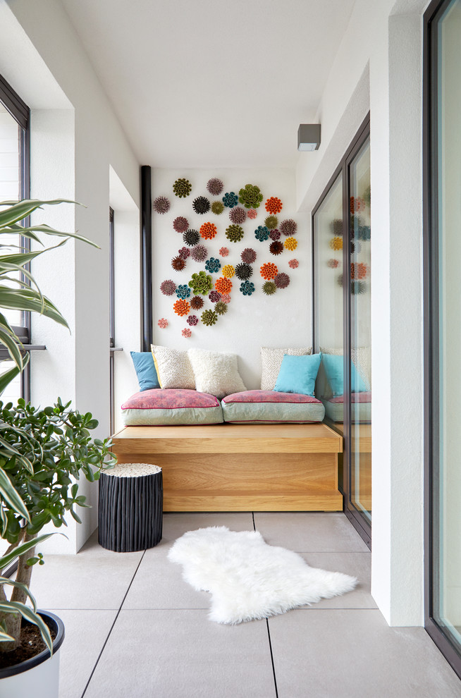 Inspiration for a mid-sized contemporary sunroom in London.