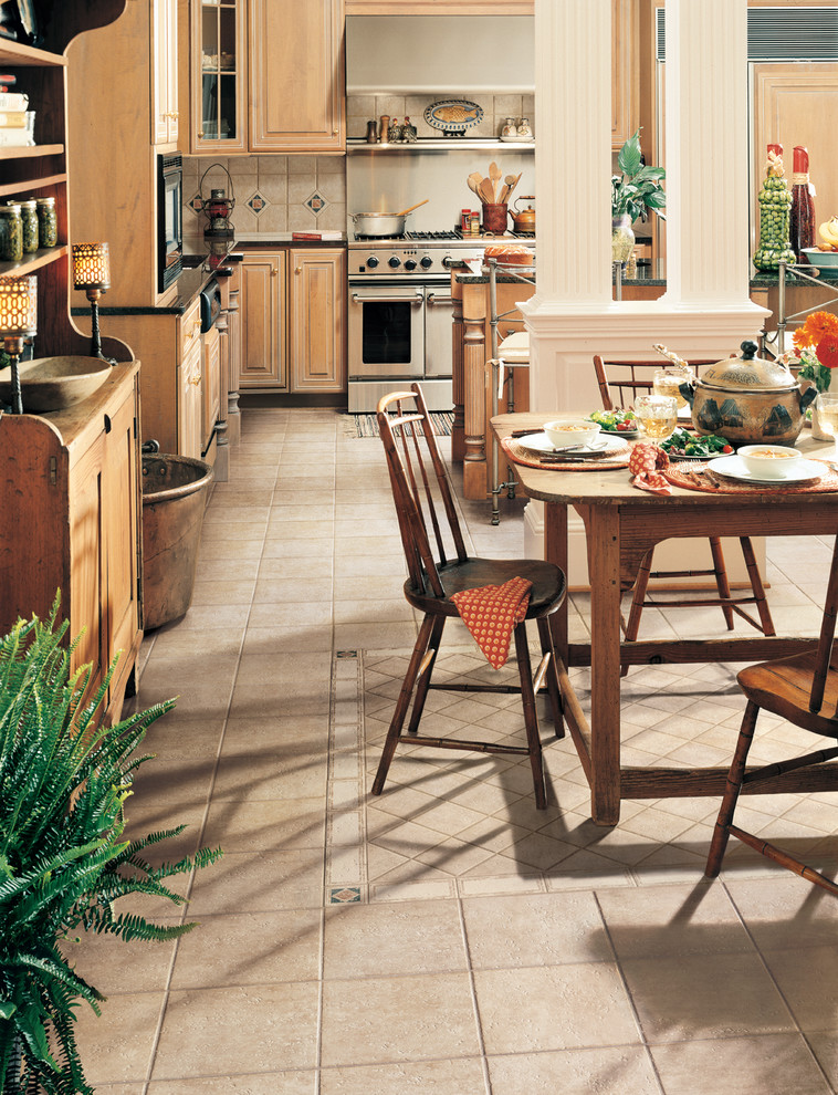 Example of a transitional porcelain tile eat-in kitchen design in Miami with medium tone wood cabinets, beige backsplash, porcelain backsplash and stainless steel appliances