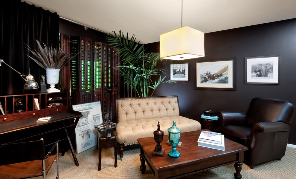 This is an example of a transitional home office in Richmond with black walls, carpet and a freestanding desk.