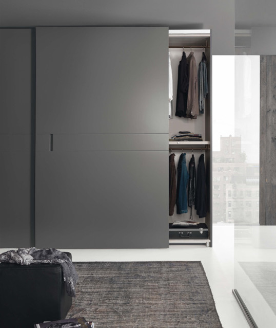 This is an example of a contemporary storage and wardrobe in Buckinghamshire.