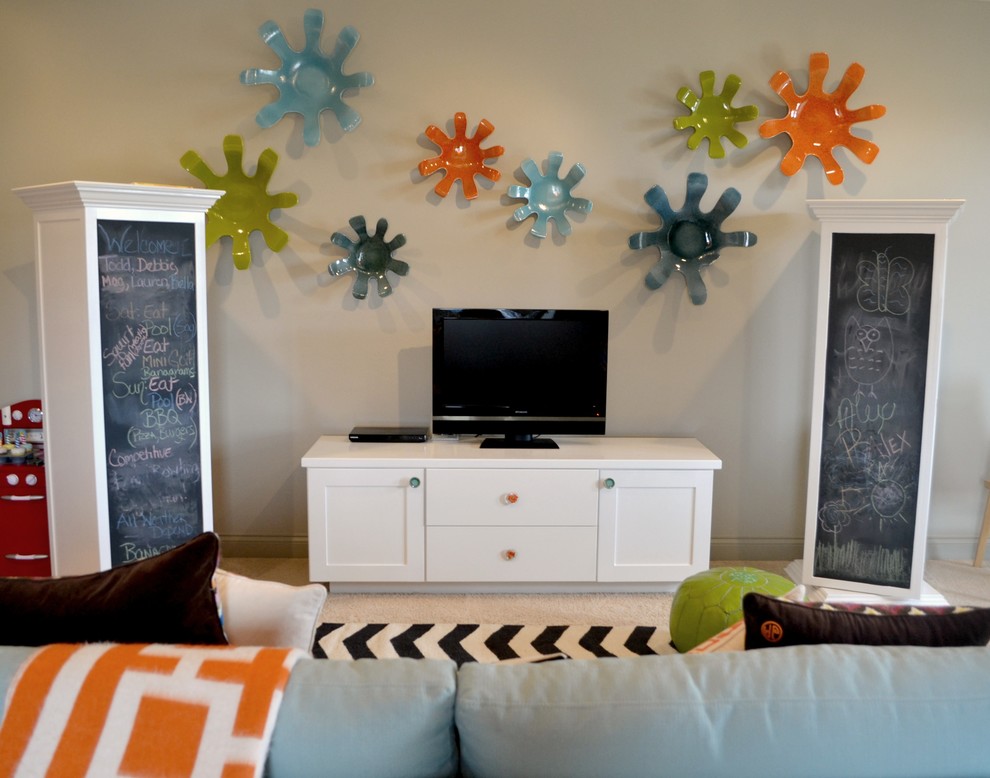 Design ideas for a large transitional gender-neutral kids' playroom for kids 4-10 years old in Indianapolis with grey walls and carpet.