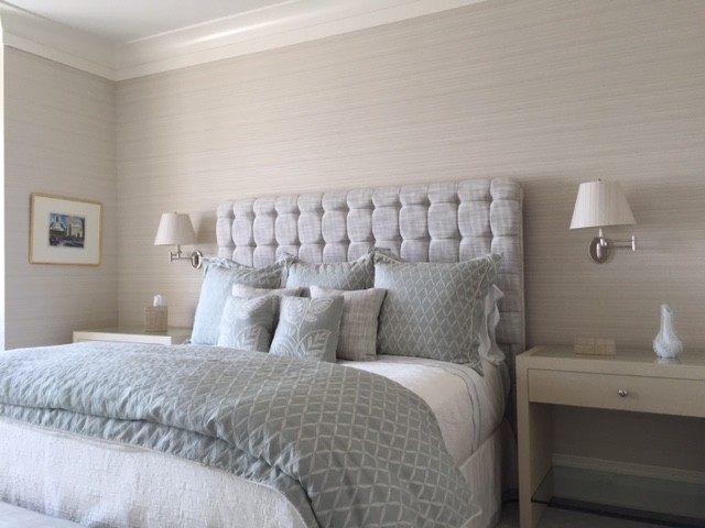 This is an example of a mid-sized traditional master bedroom in San Diego with grey walls.