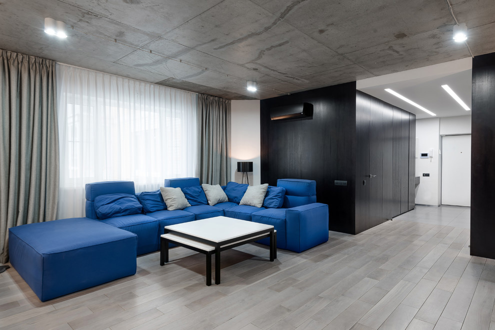 Foto di un soggiorno industriale aperto con sala formale e pavimento grigio