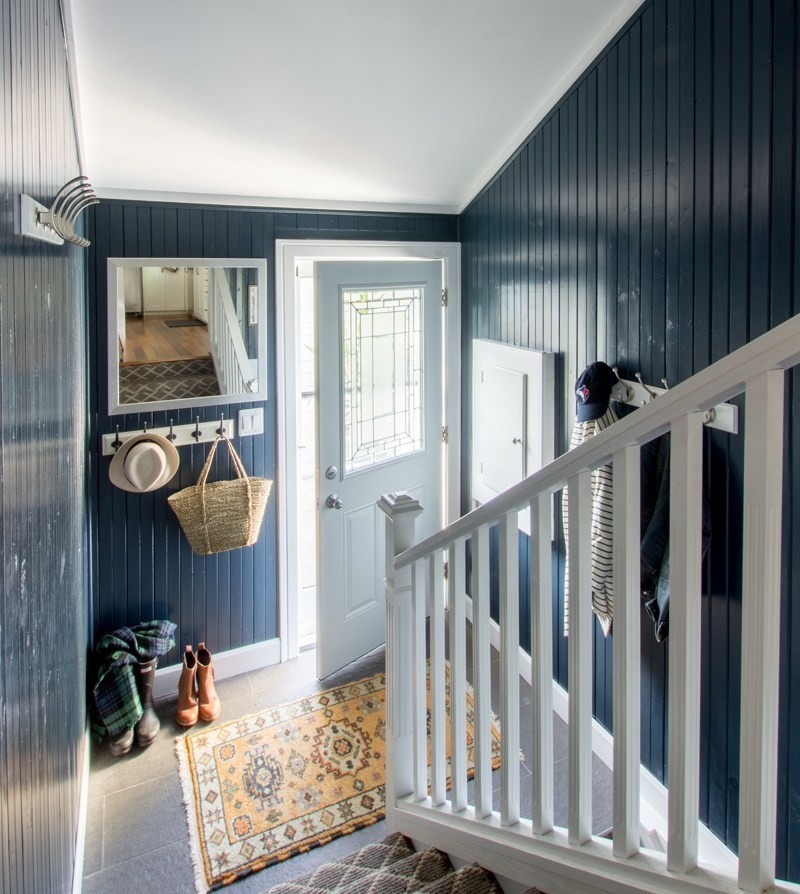Example of a small transitional slate floor and gray floor mudroom design in Toronto with blue walls and a white front door