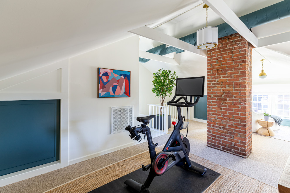 This is an example of a large bohemian multi-use home gym in Bridgeport with green walls, carpet, beige floors and exposed beams.