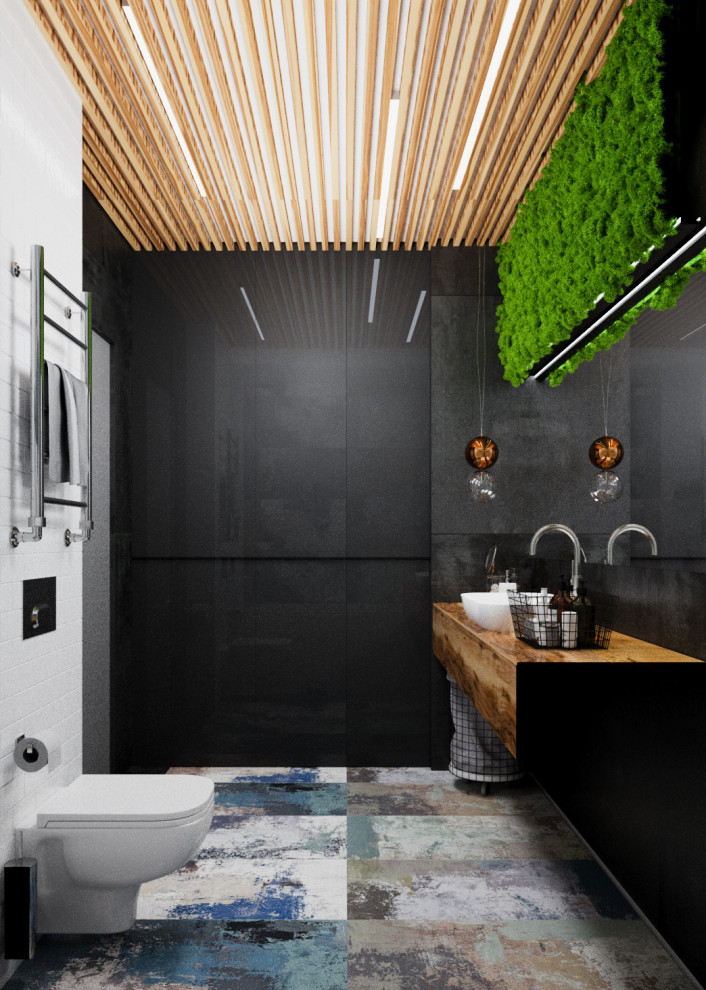 Интерьер санузла с зеленой стеной