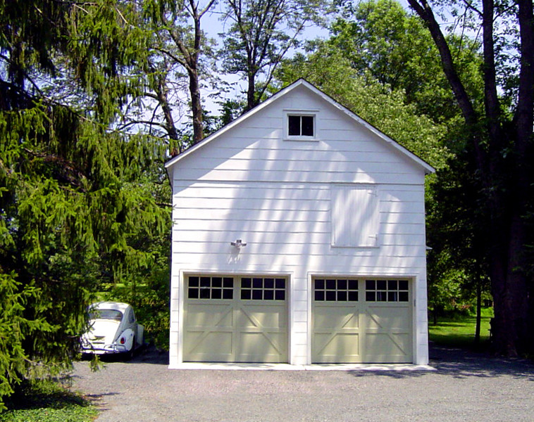 This is an example of a mid-sized country detached two-car garage in Philadelphia.