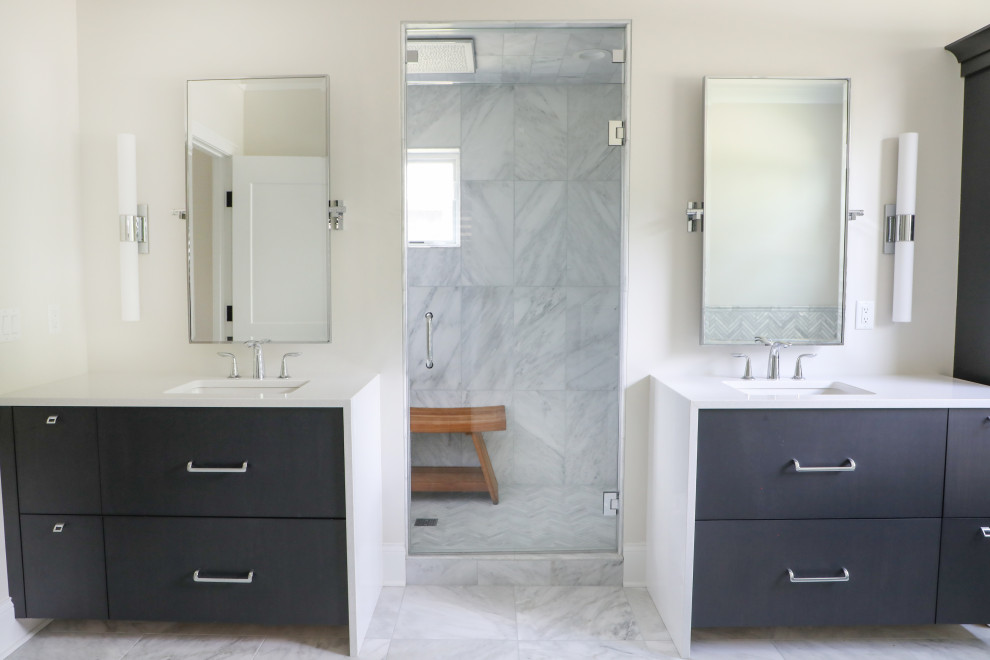 Large master bathroom in Milwaukee with flat-panel cabinets, dark wood cabinets, gray tile, white walls, an undermount sink, engineered quartz benchtops, white benchtops, an enclosed toilet, a double vanity and a floating vanity.