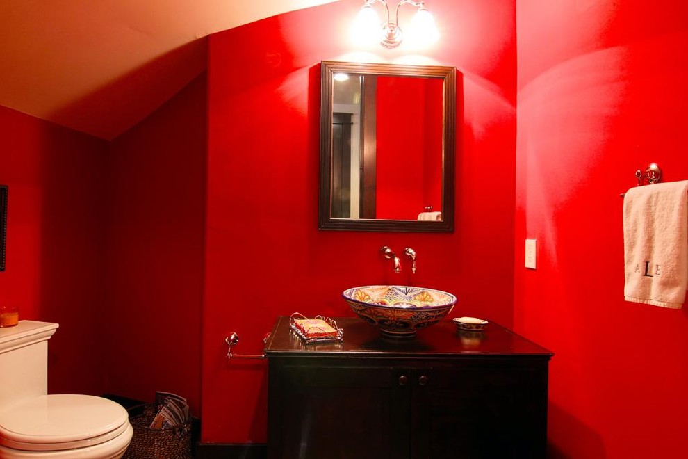 This is an example of a mediterranean powder room in Houston.