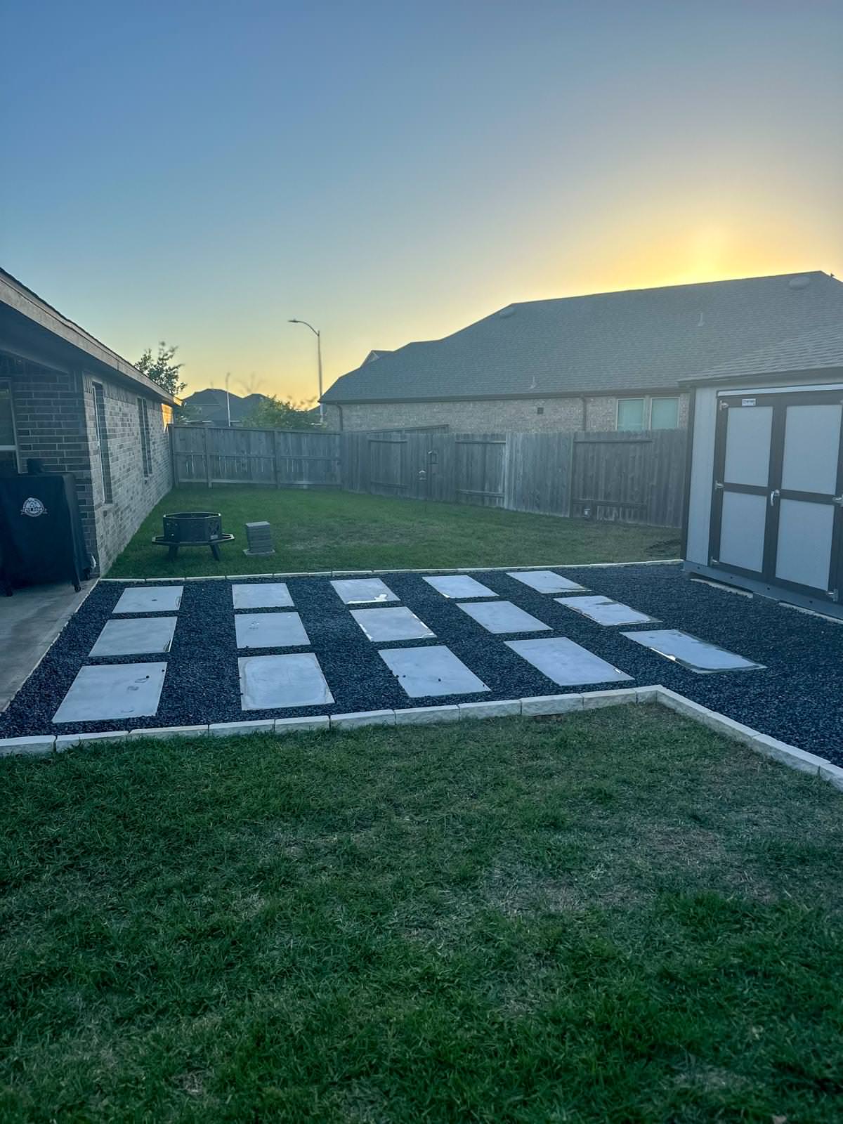 Backyard paver patio with gravel!