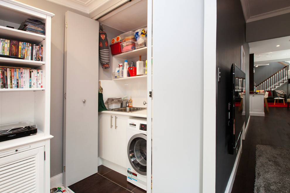 Design ideas for a transitional laundry room in Sydney.