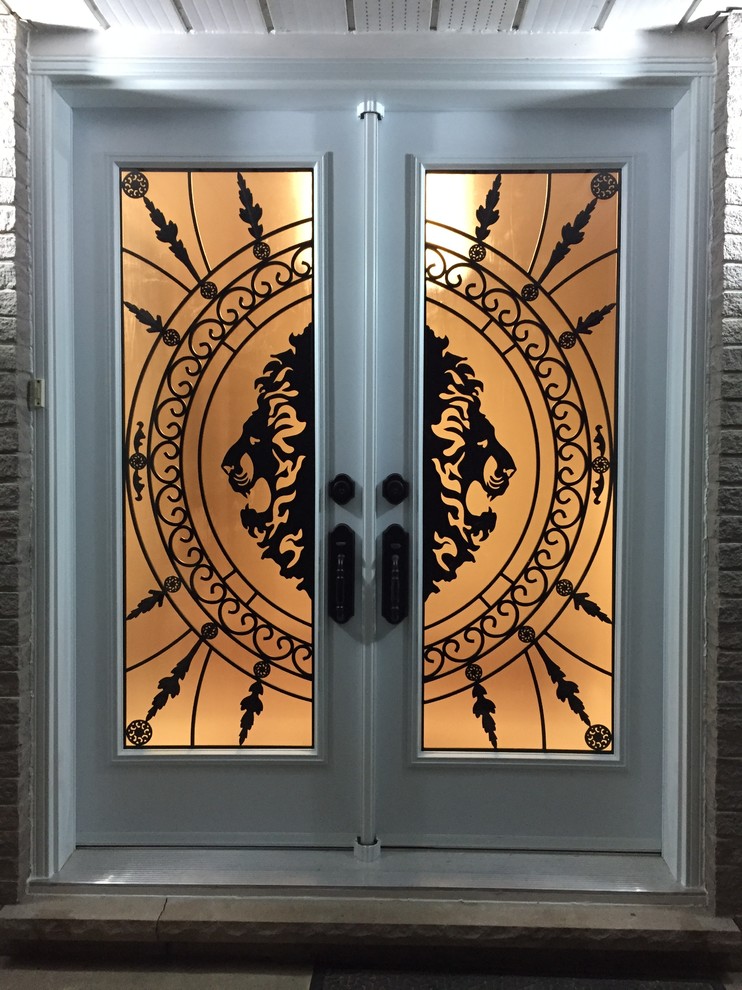 Mid-sized transitional front door photo with a glass front door